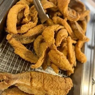 deep fried squids on a fryer