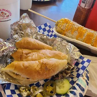 Carnea asada torte and cheesy elote.