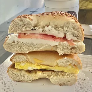Cream cheese &amp; tomato garlic bagel (top) Egg &amp; cheese plain bagel (bottom)
