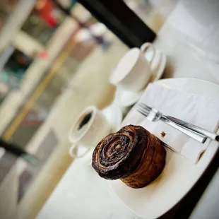 a croissant on a plate