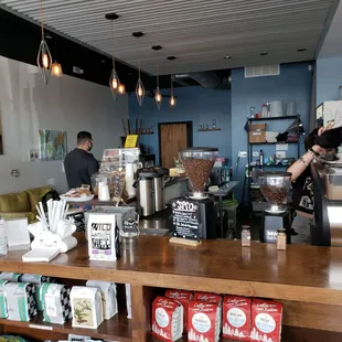 a coffee shop with people working