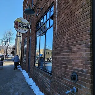 the reflection of the building across the street