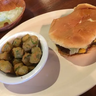 a hamburger and potato salad
