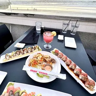 FRIED CALAMARI , RED DRAGON ROLL , TATSU ROLL , RAINBOW ROLL , MIDWAY MARGARITA at CANNONBALL