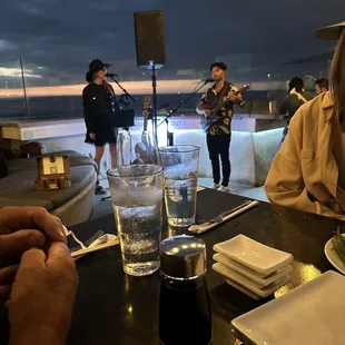 a group of people sitting at a table
