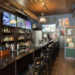 Lots of TVs and a dart board!