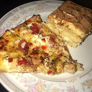 two slices of pizza on a plate