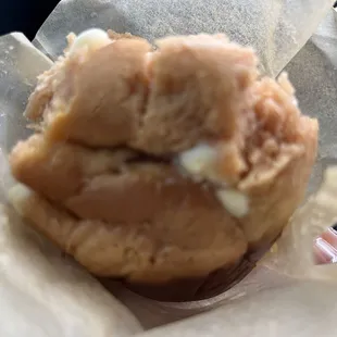 Strawberry cheesecake muffin half eaten