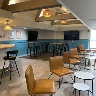 lounge area with chairs and tables