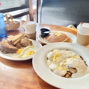 Cowboy Pile up! Order this! It&apos;s amazing - Biscuit, sausage, eggs, gravy &amp; cheese!  Also had Granny Pancakes!