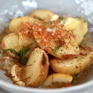 Potatoes with dill, smoked ikura and oyster gravy
