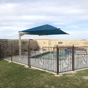 Pool time! Single pole canopy over pool area.