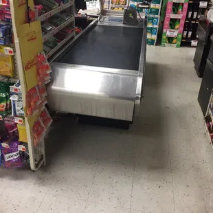 a conveyor belt in a grocery store