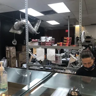 a woman in a kitchen