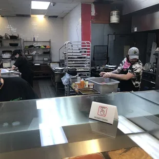 a woman working in the kitchen