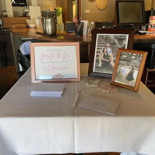 a table with a picture of the couple