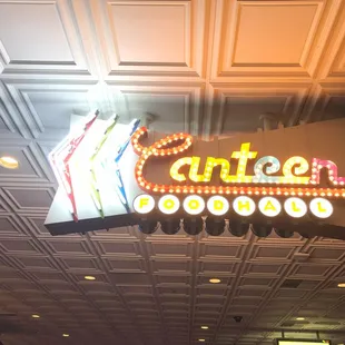 a neon sign for a restaurant