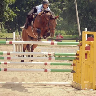 Brianna Jumping 5+ feet over the apple jack