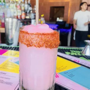 Frozen Flavored Margarita with a chamoy and tajin rim