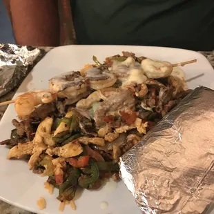 Michele steak chicken and shrimp