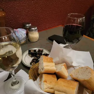 bread and wine on a table