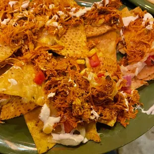 Dry, unacceptable chicken nachos.