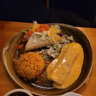 Beef taco, chicken enchilada, rice