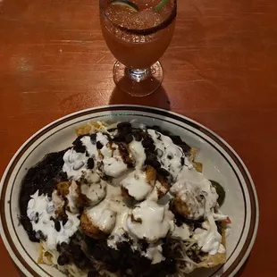 Vegan nachos - added shrimp (dairy free) &amp; Watermelon frozen margarita with a spiced rim glass.