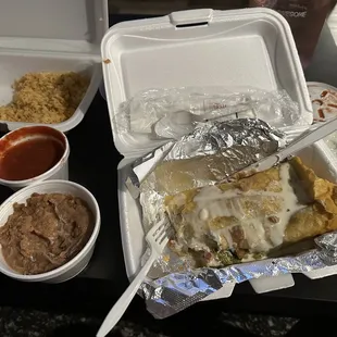 Steak chimichanga side of rice and beans