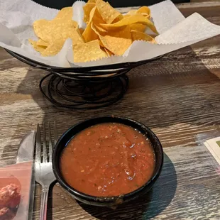 Complementary chips and salsa are great.