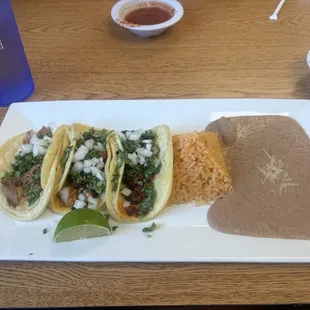 Street taco dinner: carnitas, al pastor, chorizo