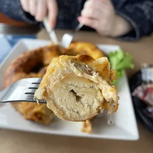 a person eating a pastry