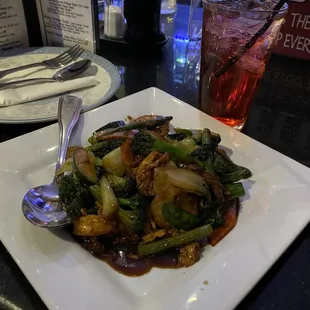 Happy Family: shrimp, beef, chicken with broccoli, zucchini and green beans in brown sauce.