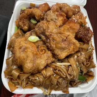 Orange chicken, pork chops, and chow fun.