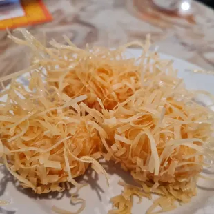 shredded cheese on a plate