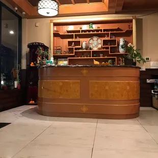 the front desk of the hotel