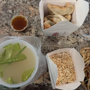 Sizzling rice soup and pot stickers