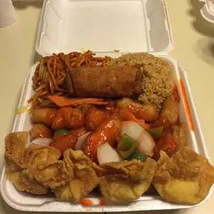 Sweet and sour chicken dinner combo (comes with crab puffs, lo mein, rice, and an egg roll).