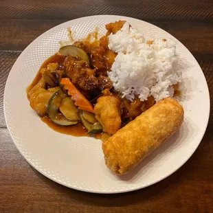 Sesame Chicken with chicken Egg Roll.