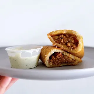 G2. Empanada con Carne Molida