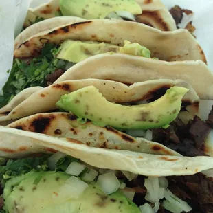 Lunch combo - four fajita tacos with a side charro beans.