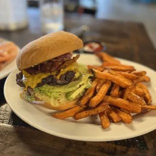 a burger and fries on a plate