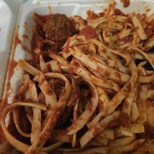 Dry spaghetti noodles and vegan meatballs for the dead.