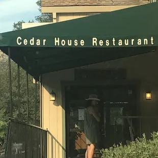 the entrance to cedar house restaurant