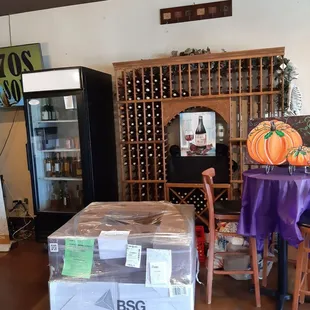 a wine cellar with a table and chairs
