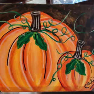a painting of two pumpkins