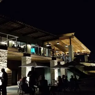 Canyon Farms Clubhouse back patio at night.