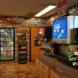 Coke and Pepsi products. Yep that's right BOTH. They also have a little mix in syrup thing.