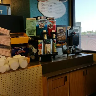 a counter with a variety of food items