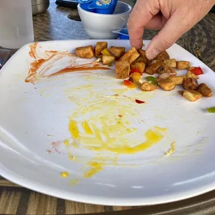 a plate of food left on the table